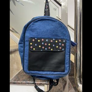 Denim tagged backpack